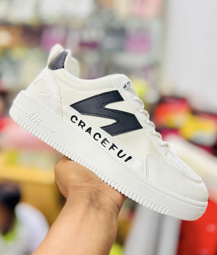 N (White )converse lace free casual sneakers for boys. - Image 3