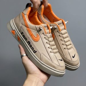 FAN BOND ARTICEL cream and orange colour sneakers for men.