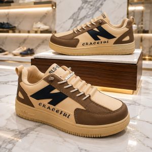Brown N design lace free lightweight sneakers for men.
